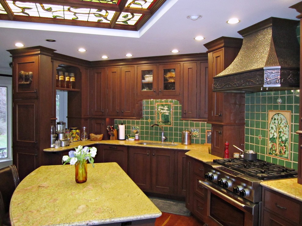 This is an example of a large classic u-shaped kitchen/diner in Other with a single-bowl sink, beaded cabinets, dark wood cabinets, marble worktops, green splashback, ceramic splashback, stainless steel appliances, dark hardwood flooring, an island, brown floors and yellow worktops.