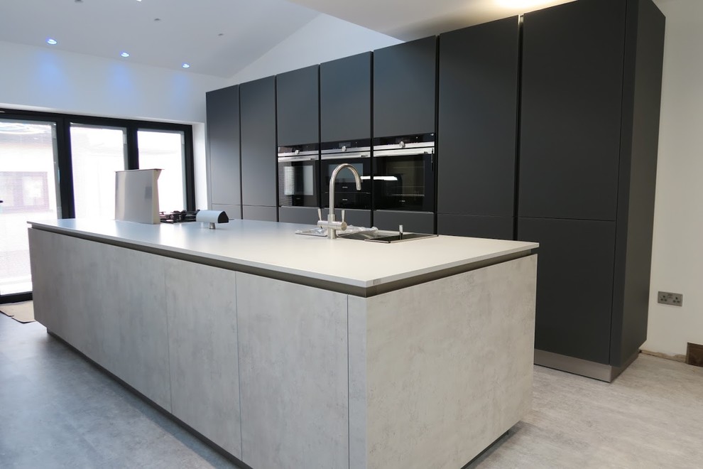 Concrete and matt glass kitchen Contemporary Kitchen London by Contemporary Home Design