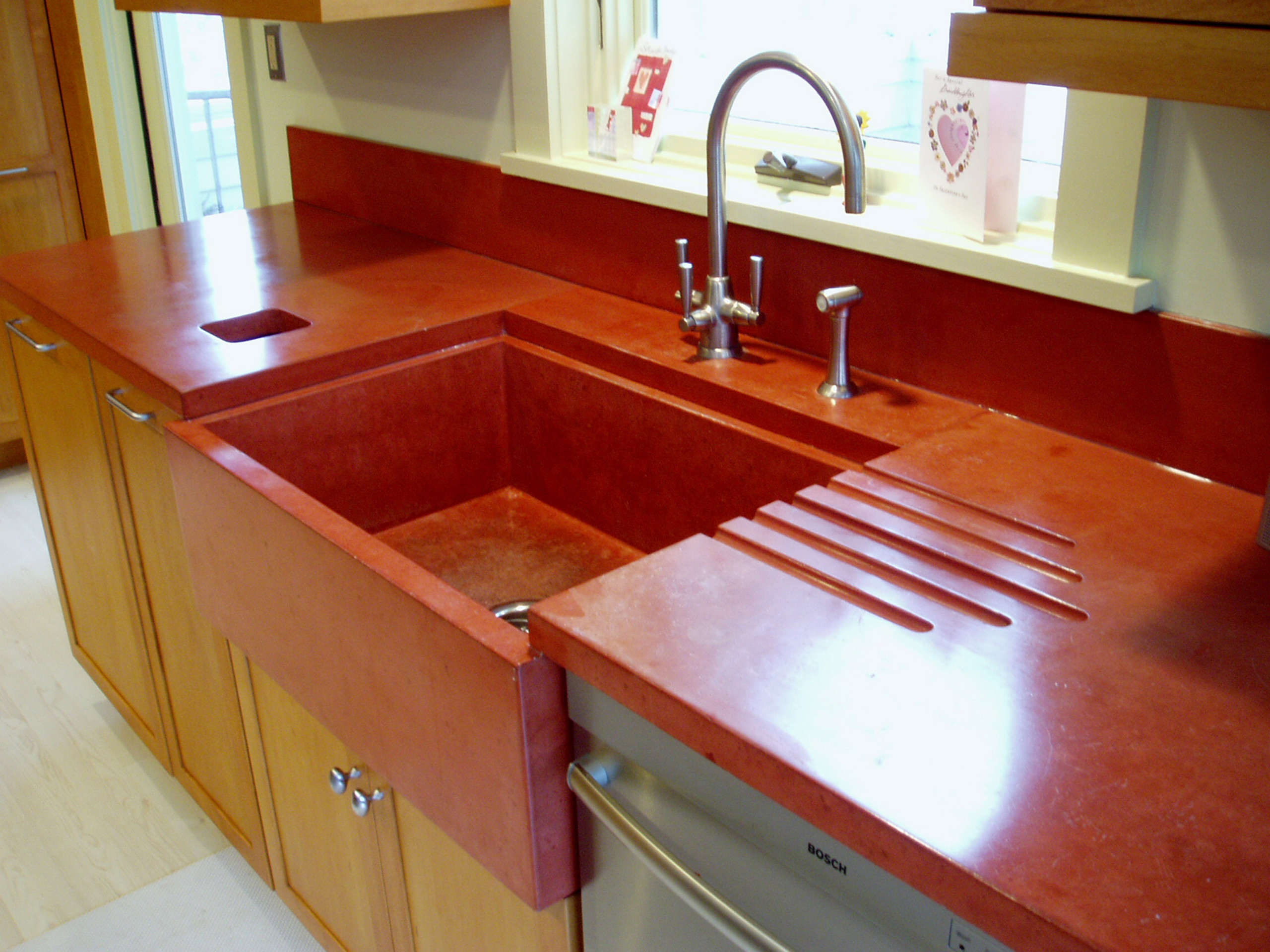 https://st.hzcdn.com/simgs/pictures/kitchens/concrete-countertop-in-custom-color-with-farm-sink-and-drainboard-brooks-custom-img~5cc14fe10ef0ecb6_14-3027-1-46c7706.jpg