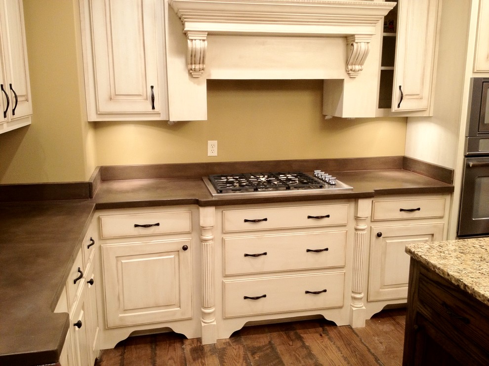 Concrete countertops & backsplash by Burco Surface & Decor