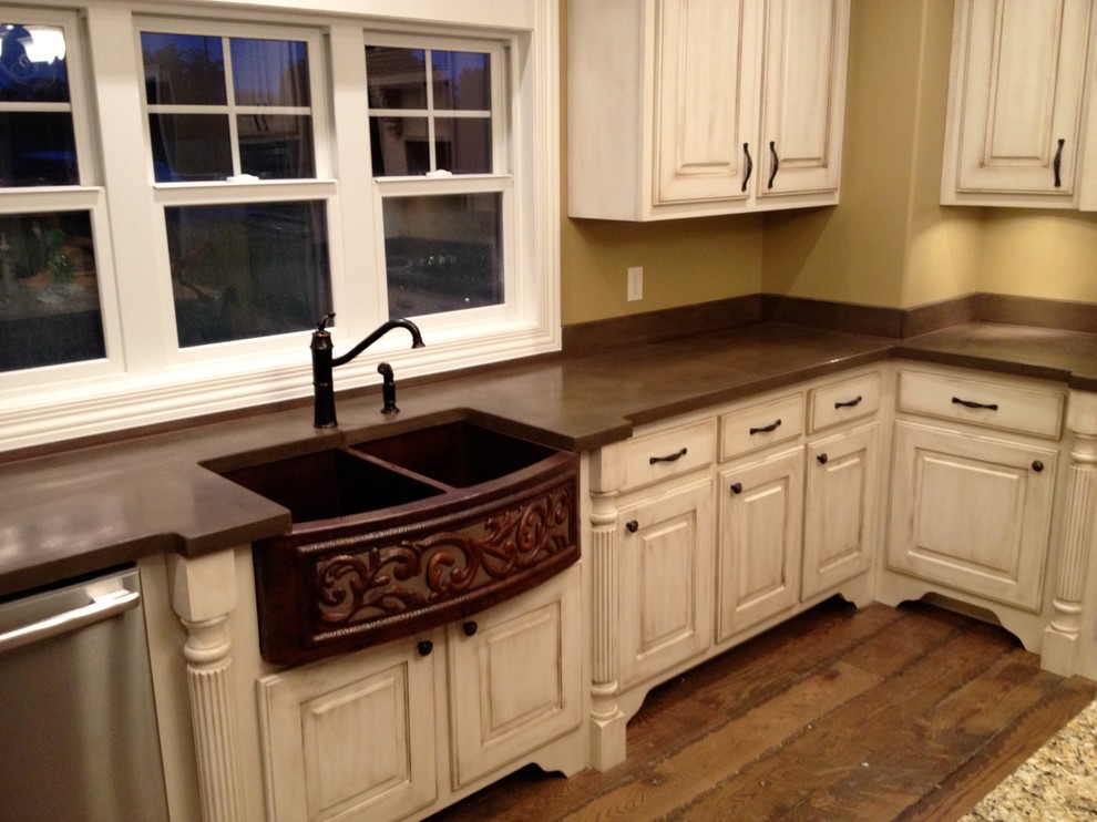 Concrete countertops & backsplash by Burco Surface & Decor