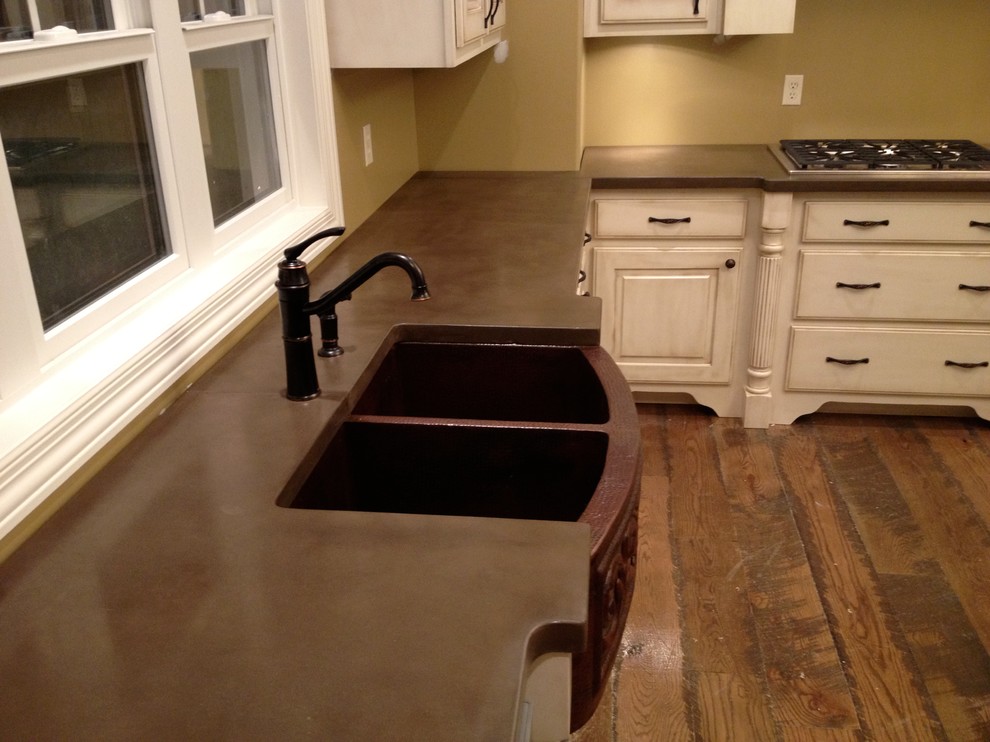 Concrete countertops & backsplash by Burco Surface & Decor