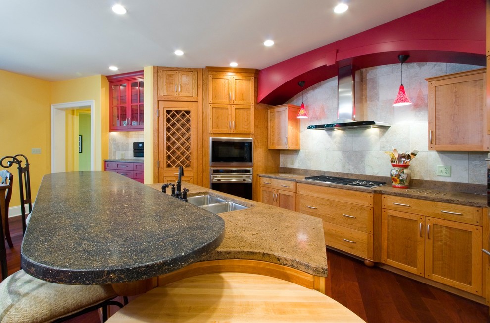 Example of a large galley dark wood floor open concept kitchen design in Other with a double-bowl sink, recessed-panel cabinets, light wood cabinets, concrete countertops, white backsplash, ceramic backsplash, stainless steel appliances and an island