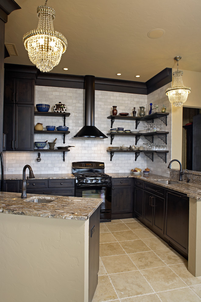 Inspiration for a mid-sized eclectic u-shaped ceramic tile kitchen remodel in Milwaukee with a single-bowl sink, flat-panel cabinets, gray cabinets, granite countertops, white backsplash, subway tile backsplash, black appliances and a peninsula