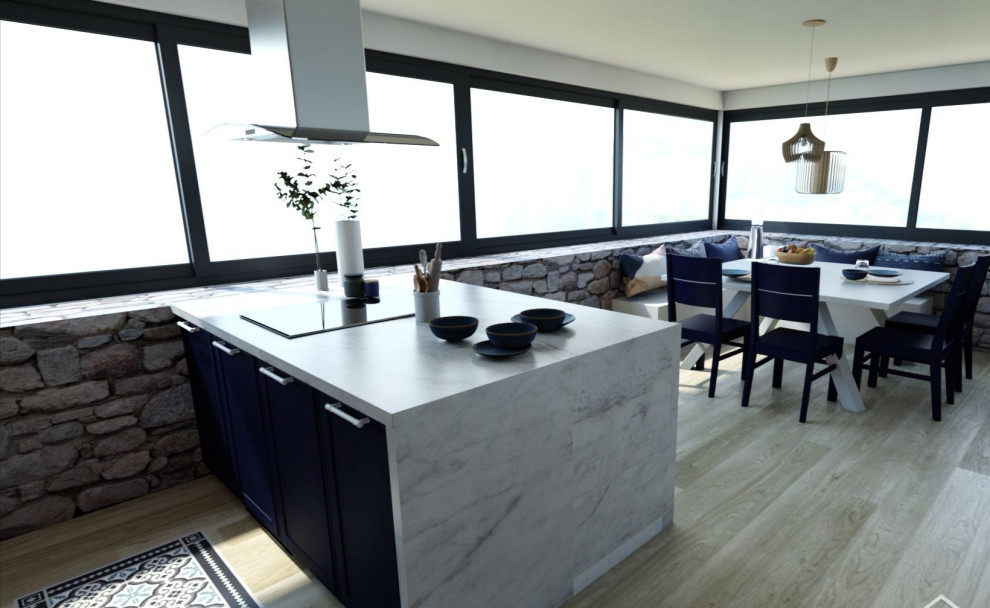 Large classic galley open plan kitchen in Other with an island, a submerged sink, beaded cabinets, blue cabinets, marble worktops, blue splashback, integrated appliances, light hardwood flooring and white worktops.