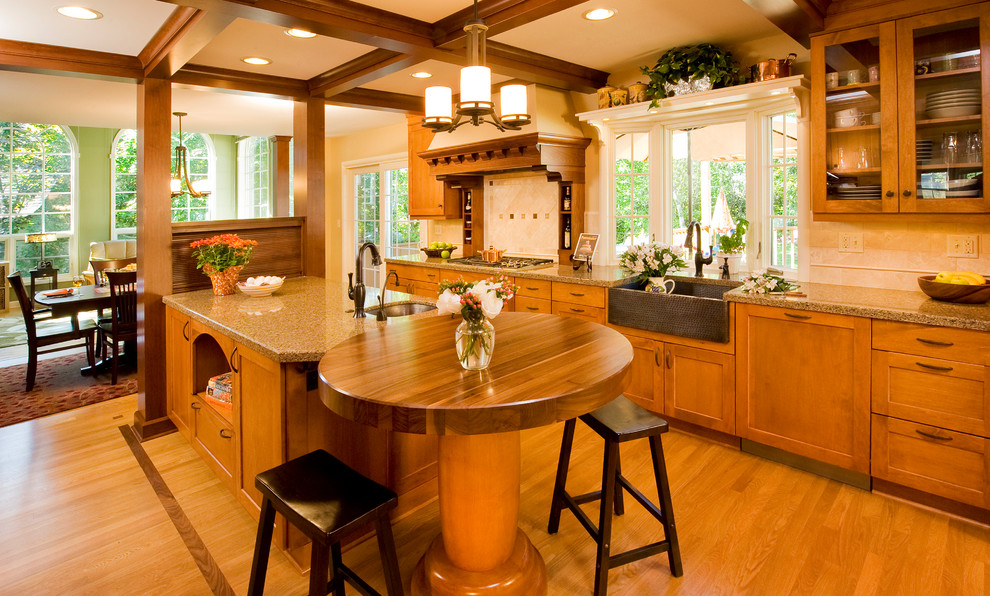 Example of a classic kitchen design in Other with shaker cabinets, a farmhouse sink and granite countertops