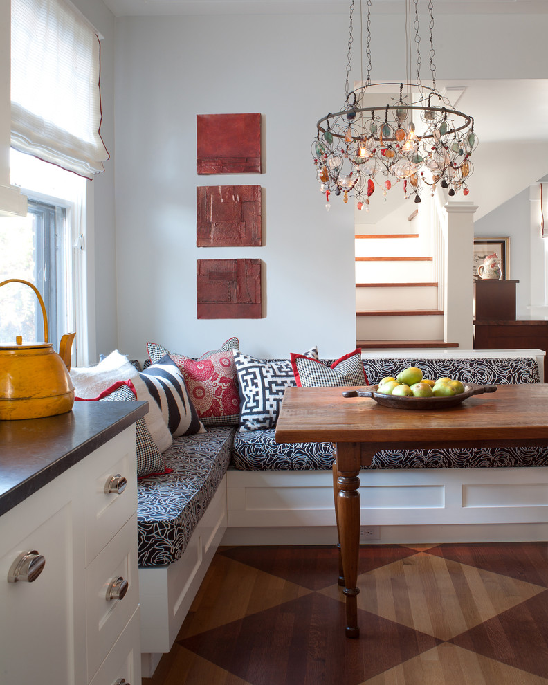 Transitional medium tone wood floor eat-in kitchen photo in Denver with shaker cabinets and white cabinets