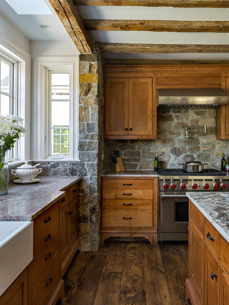 Large elegant u-shaped medium tone wood floor and brown floor open concept kitchen photo in Bridgeport with a farmhouse sink, shaker cabinets, medium tone wood cabinets, granite countertops, gray backsplash, stone tile backsplash, stainless steel appliances and an island