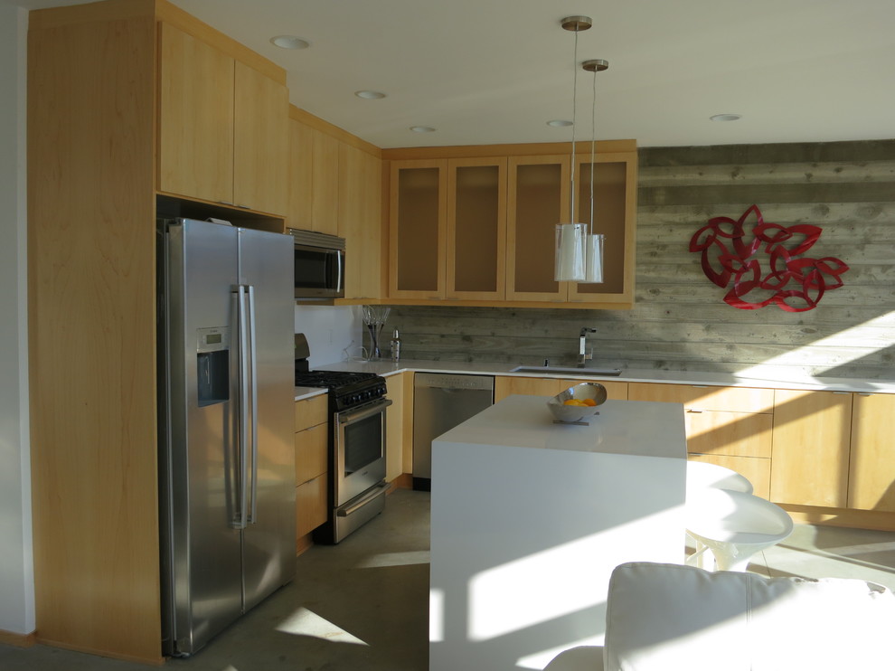 Contemporary kitchen in Orange County with stainless steel appliances.