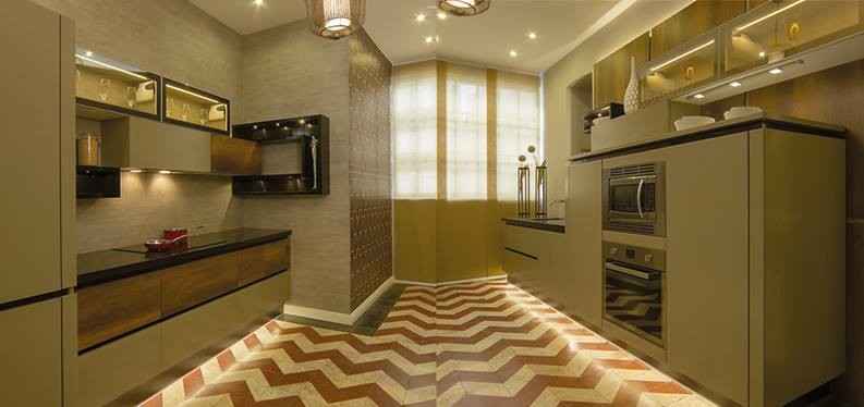 Esempio di una cucina parallela minimalista chiusa e di medie dimensioni con ante di vetro, top in superficie solida, elettrodomestici in acciaio inossidabile e pavimento con piastrelle in ceramica