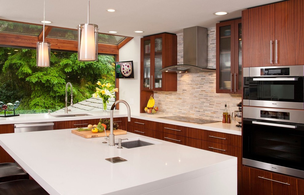Mid-sized trendy l-shaped dark wood floor kitchen photo in Seattle with an undermount sink, flat-panel cabinets, medium tone wood cabinets, multicolored backsplash, mosaic tile backsplash, stainless steel appliances, an island and quartz countertops
