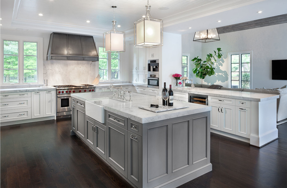 Kitchen - large dark wood floor kitchen idea in DC Metro with a farmhouse sink, marble countertops and stainless steel appliances