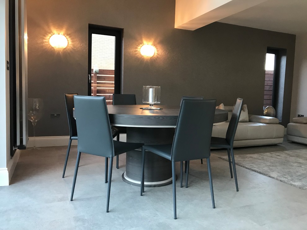 Medium sized contemporary open plan dining room in Other with vinyl flooring.