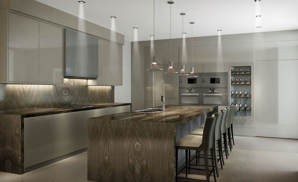 Eat-in kitchen - large modern l-shaped slate floor and brown floor eat-in kitchen idea in Miami with a double-bowl sink, flat-panel cabinets, gray cabinets, quartz countertops, multicolored backsplash, stone slab backsplash, paneled appliances and an island