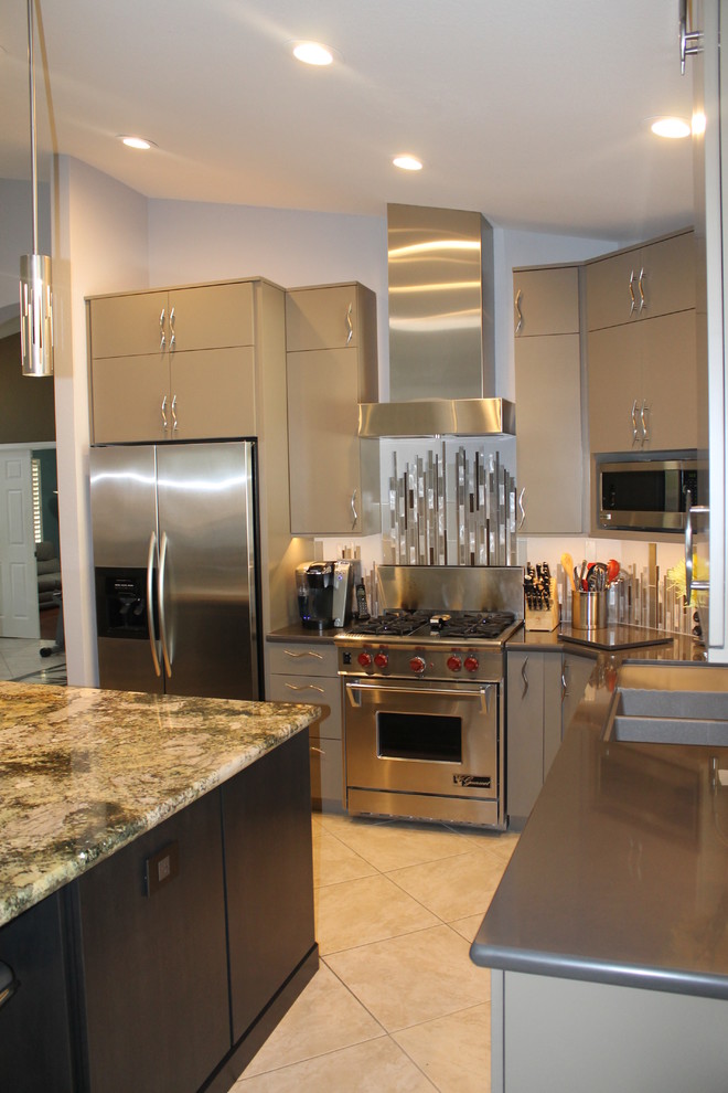 Example of a small trendy l-shaped porcelain tile and beige floor open concept kitchen design in Phoenix with an undermount sink, flat-panel cabinets, gray cabinets, quartz countertops, metallic backsplash, mosaic tile backsplash, stainless steel appliances and an island