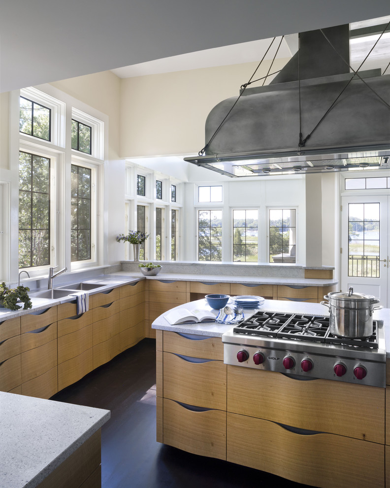 This is an example of a contemporary kitchen in New York with stainless steel appliances.