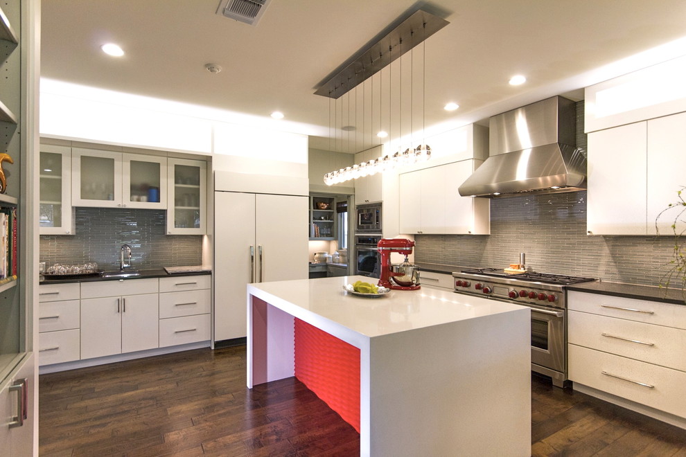 Trendy kitchen photo in Austin with paneled appliances