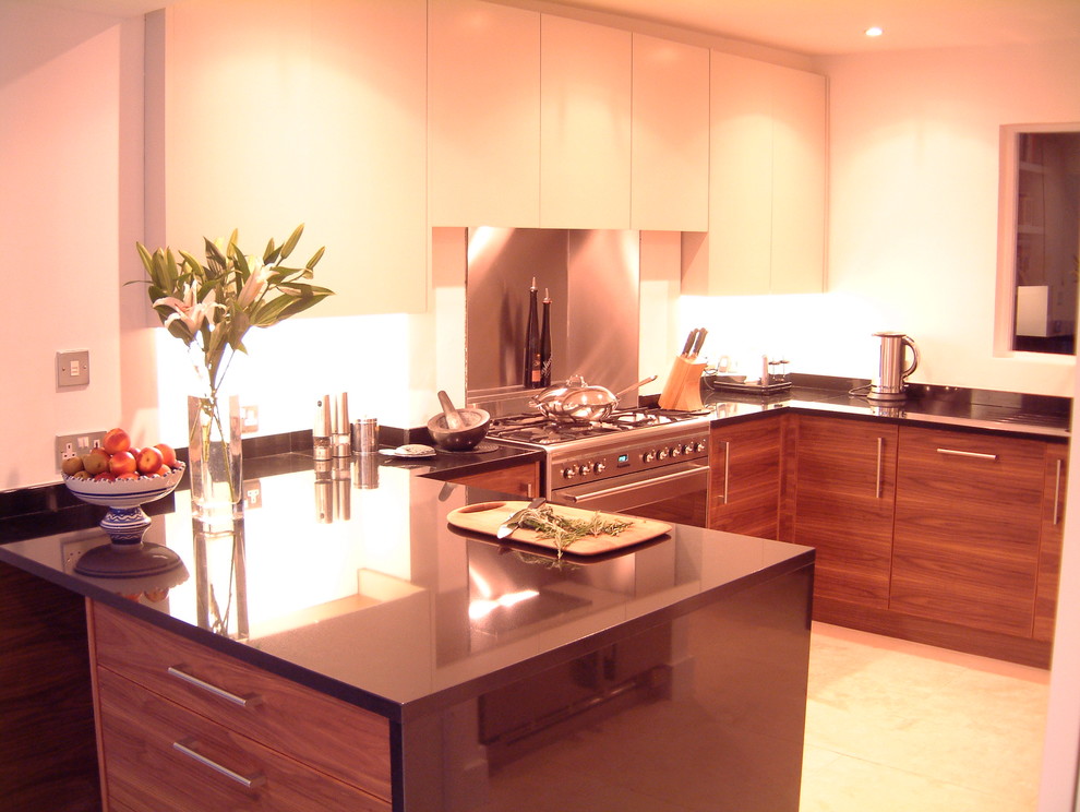 This is an example of a medium sized contemporary u-shaped kitchen in London.
