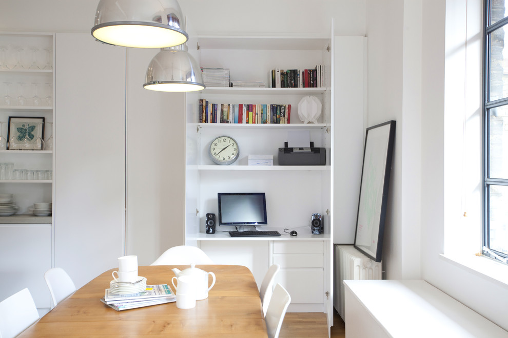 Inspiration for a contemporary kitchen in London with stainless steel appliances.