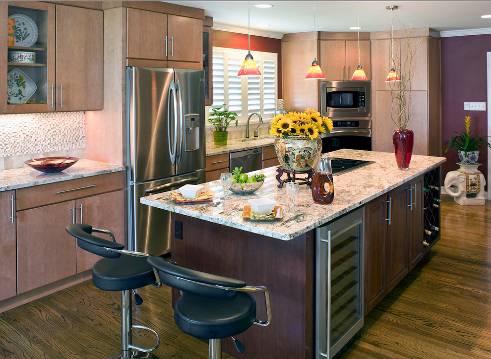 Mid-sized trendy l-shaped medium tone wood floor eat-in kitchen photo in St Louis with an undermount sink, flat-panel cabinets, light wood cabinets, granite countertops, beige backsplash, stone tile backsplash, stainless steel appliances and an island