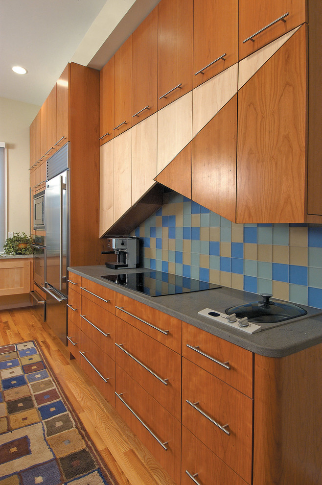 Photo of a contemporary kitchen in Other with composite countertops.
