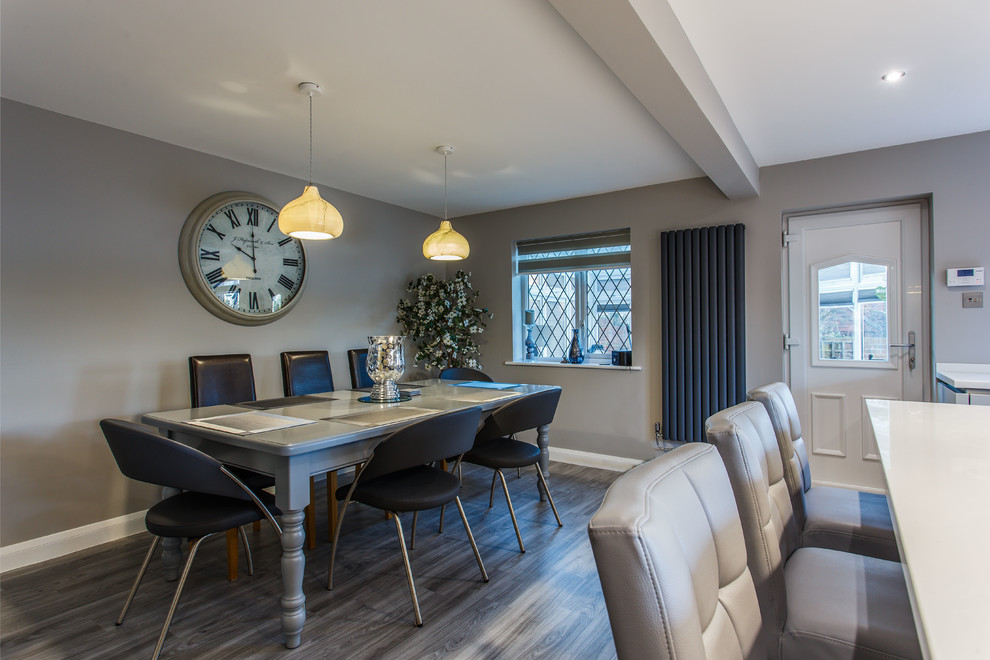 This is an example of a contemporary dining room in Sussex.