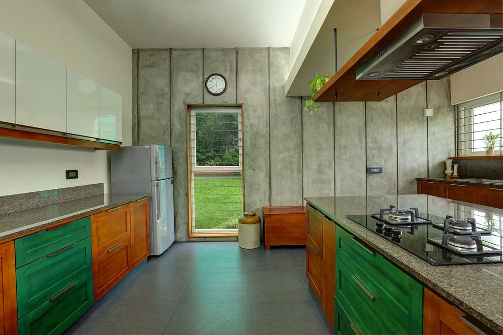 Photo of a contemporary grey and white kitchen in Bengaluru.
