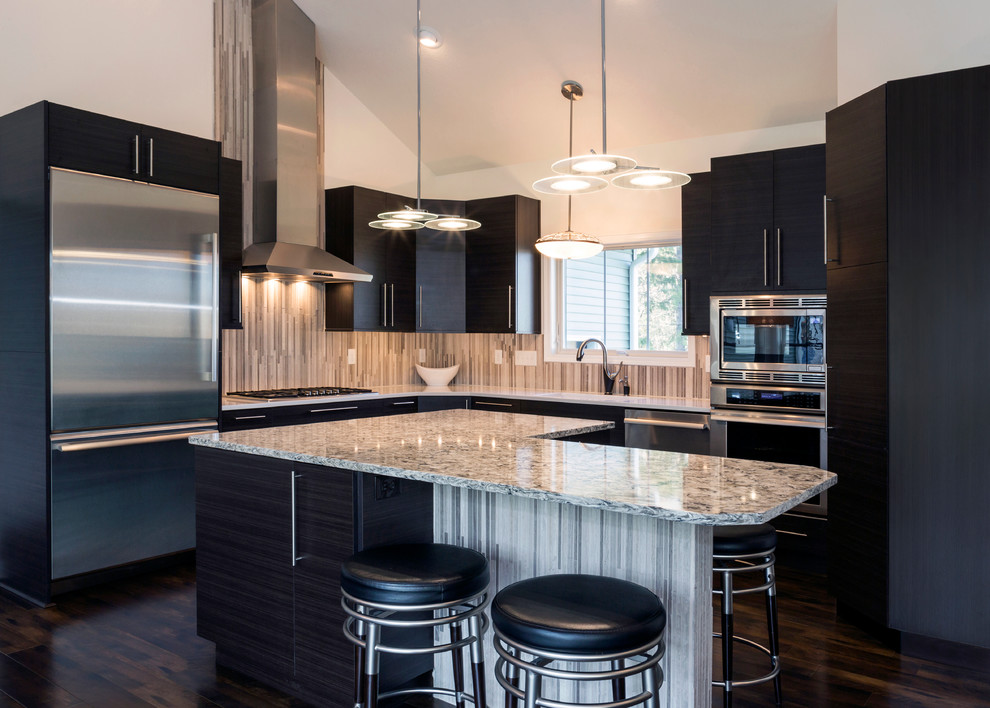 Medium sized contemporary l-shaped open plan kitchen in New York with a submerged sink, flat-panel cabinets, dark wood cabinets, engineered stone countertops, brown splashback, glass tiled splashback, stainless steel appliances, dark hardwood flooring and an island.