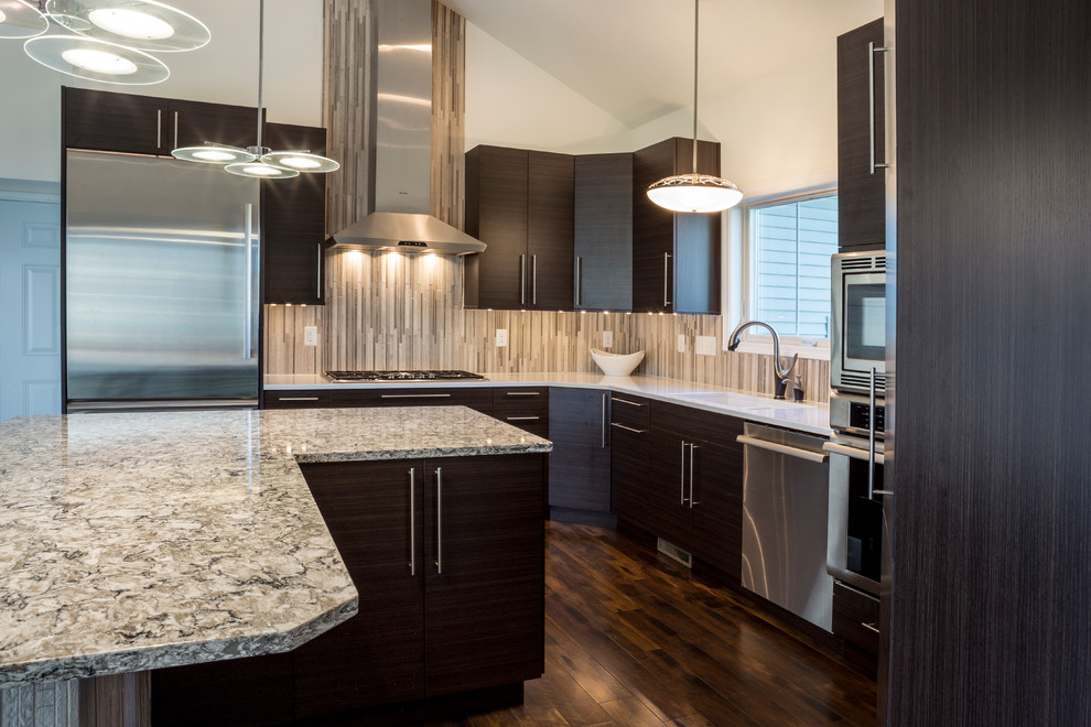 Mid-sized trendy l-shaped dark wood floor open concept kitchen photo in New York with an undermount sink, flat-panel cabinets, dark wood cabinets, quartz countertops, brown backsplash, glass tile backsplash, stainless steel appliances and an island