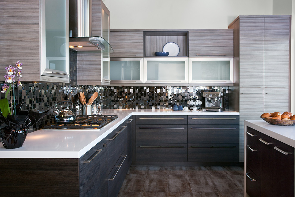 Photo of a contemporary l-shaped kitchen in Chicago with flat-panel cabinets, medium wood cabinets, metallic splashback, mirror splashback, integrated appliances and an island.