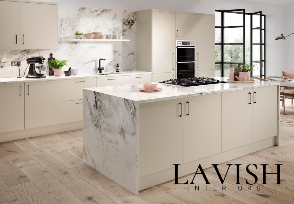 Design ideas for a contemporary kitchen in Kent with flat-panel cabinets.