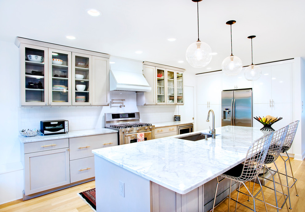Inspiration for a modern kitchen remodel in Austin with marble countertops
