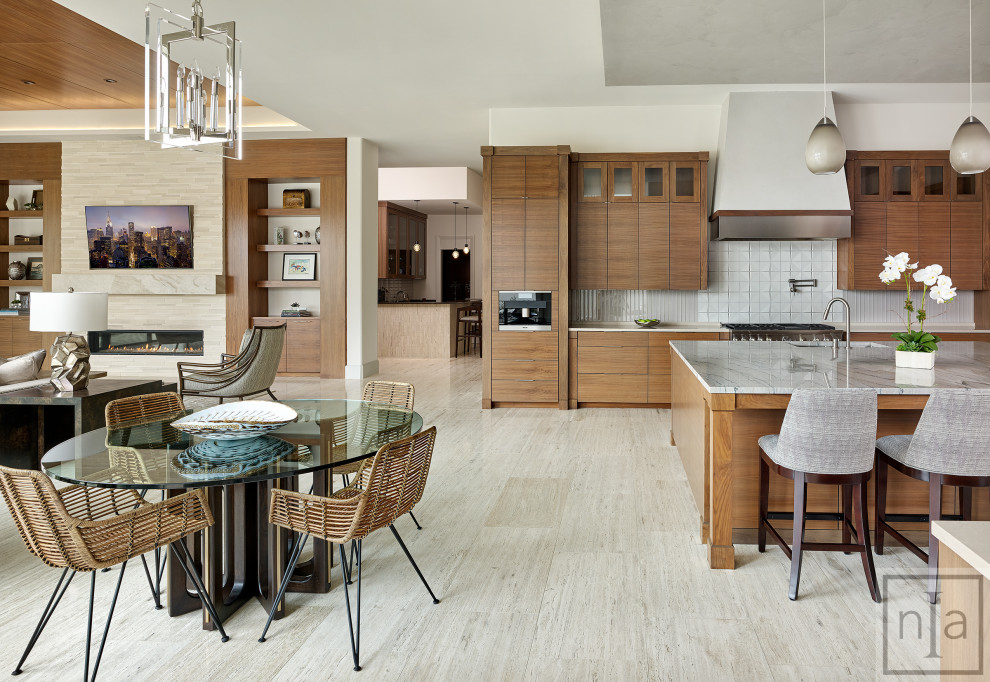 Foto di una cucina minimal con paraspruzzi bianco, parquet chiaro, pavimento bianco, ante marroni, elettrodomestici in acciaio inossidabile e top bianco