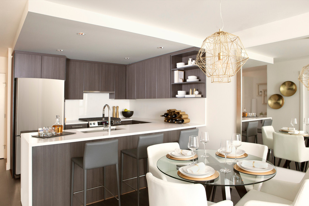 Contemporary kitchen in Vancouver with stainless steel appliances.