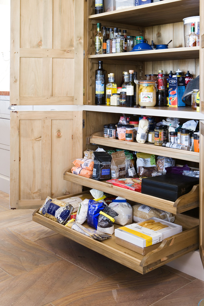 Large elegant kitchen pantry photo in Other