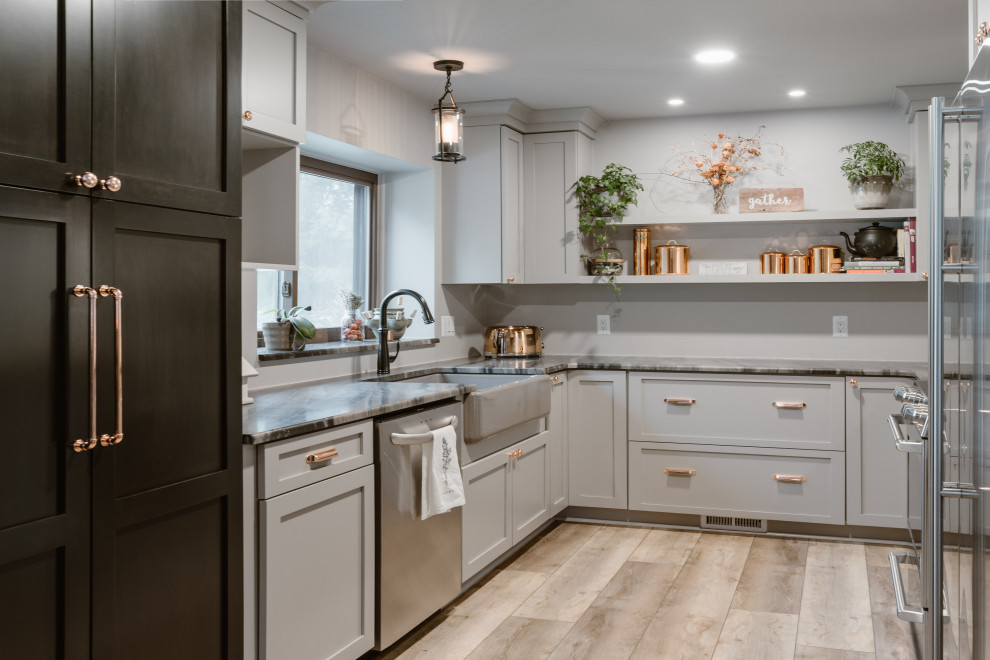 Cottage u-shaped beige floor kitchen photo in Detroit with a farmhouse sink, shaker cabinets, gray cabinets, stainless steel appliances, no island and gray countertops