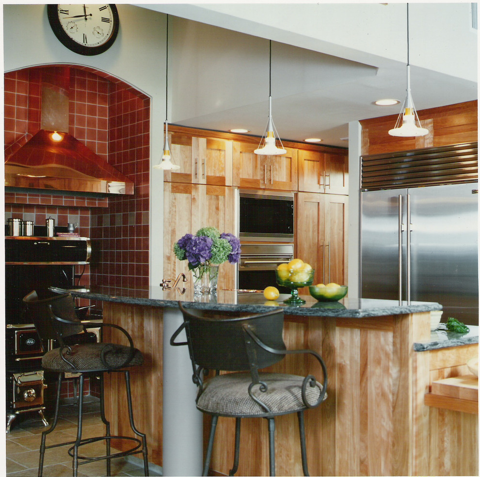 Copper range hood and wood burning stove. Contemporary Kitchen