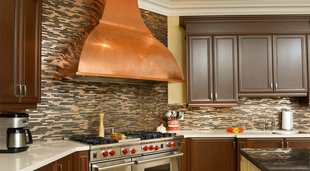 Example of a huge minimalist kitchen design in Orlando with multicolored backsplash and stone slab backsplash