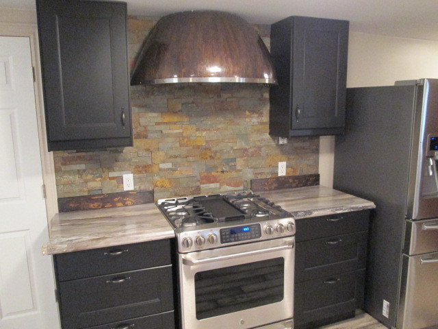 This is an example of a rustic kitchen in Toronto.