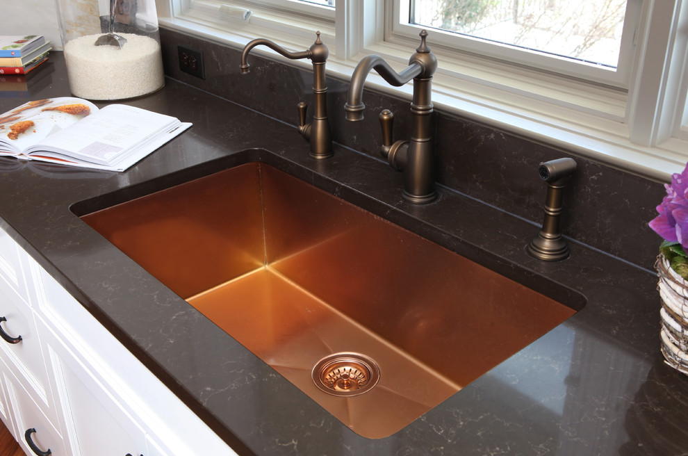 kitchen sink with black granite