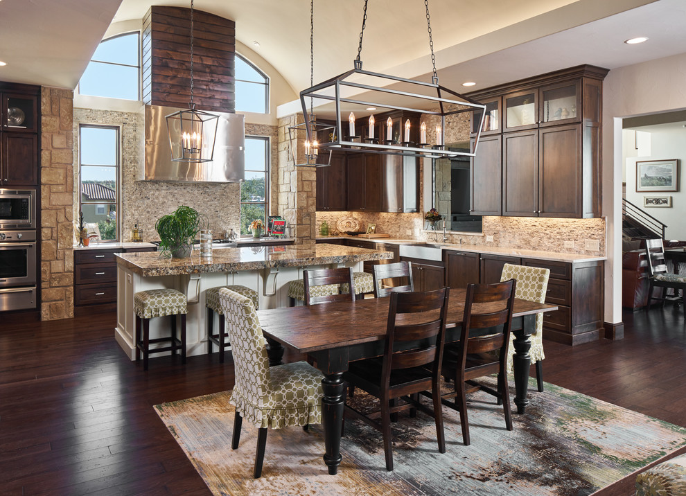 Mid-sized transitional u-shaped dark wood floor eat-in kitchen photo in Austin with shaker cabinets, dark wood cabinets, beige backsplash, stainless steel appliances, an island, a farmhouse sink, marble countertops and stone tile backsplash