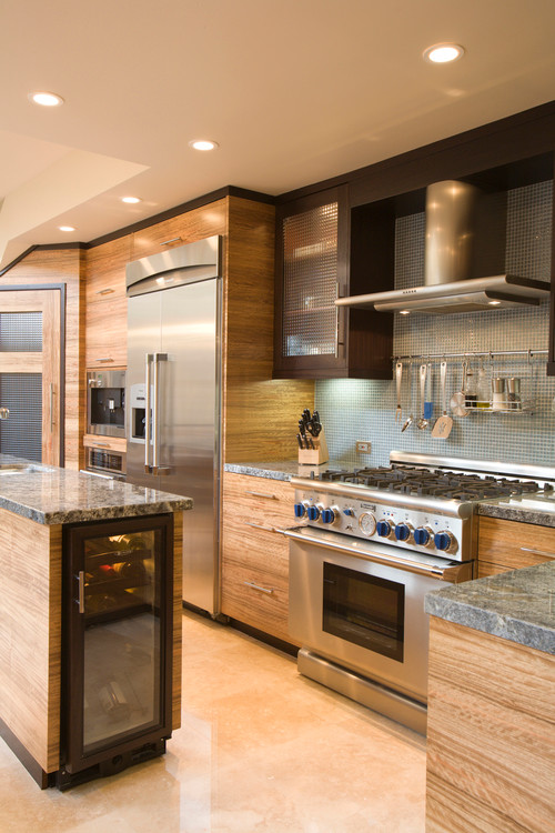 Photo of a medium sized contemporary u-shaped kitchen/diner in San Diego with flat-panel cabinets, medium wood cabinets, granite worktops, blue splashback, mosaic tiled splashback, stainless steel appliances, ceramic flooring, an island, a submerged sink and beige floors.