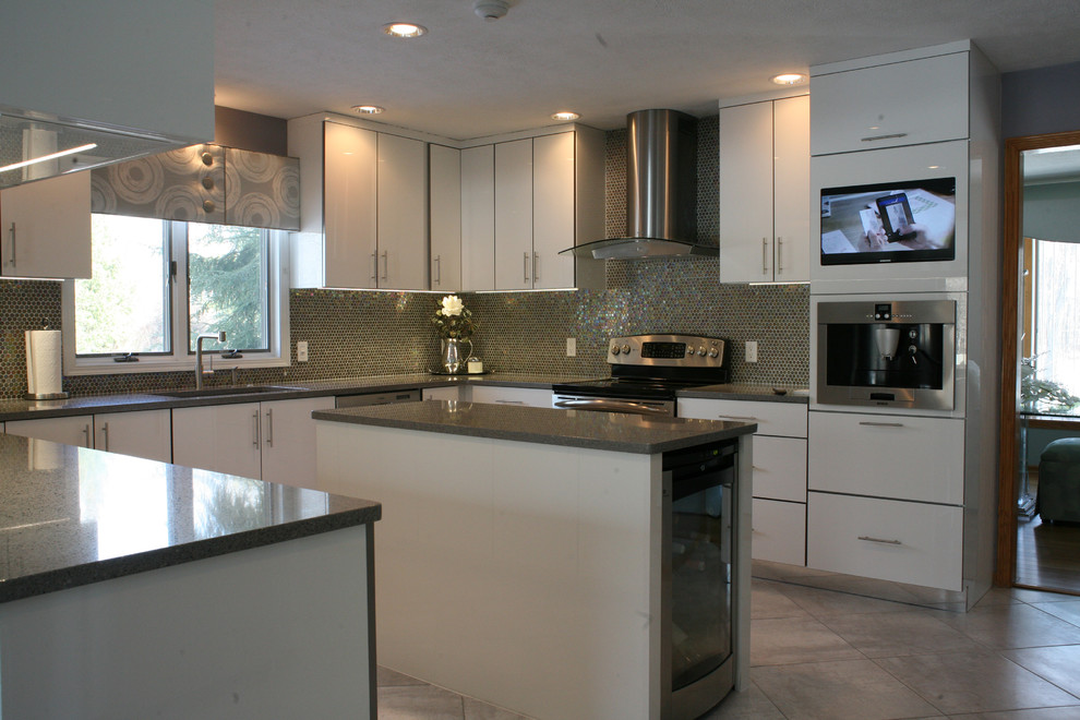 Trendy u-shaped eat-in kitchen photo in Cleveland with flat-panel cabinets, white cabinets, mosaic tile backsplash and an island