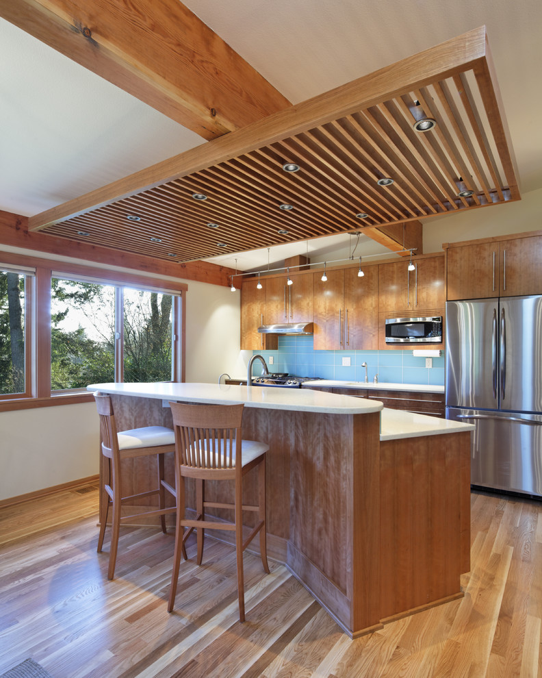 Design ideas for a contemporary kitchen in Portland with stainless steel appliances.