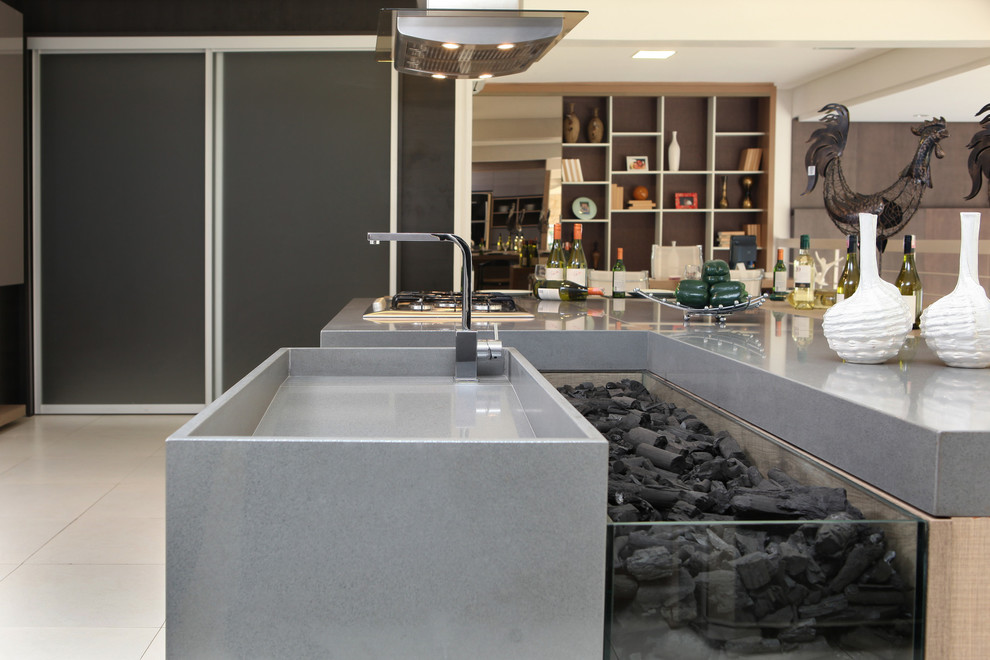 Esempio di una cucina moderna di medie dimensioni con lavello a doppia vasca, ante lisce, ante nere, top in granito, paraspruzzi multicolore, paraspruzzi con piastrelle a mosaico, elettrodomestici in acciaio inossidabile, pavimento in terracotta e penisola