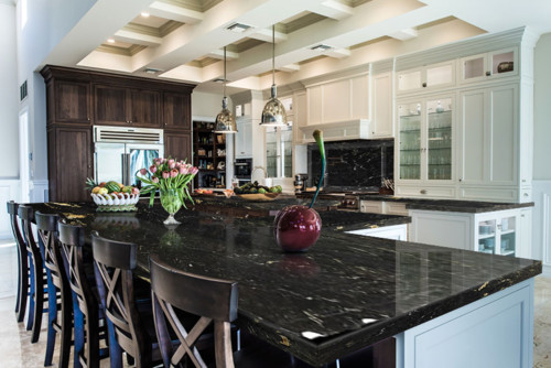 Contemporary kitchen with natural stone countertops