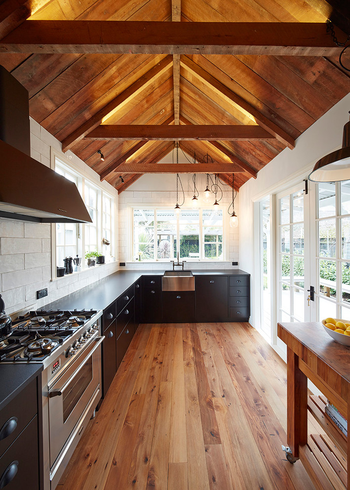 Inspiration for an industrial kitchen remodel in Auckland