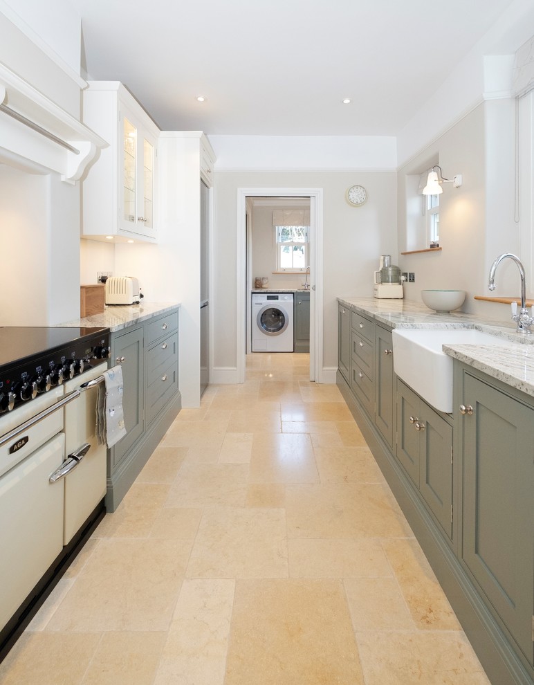 Small traditional galley enclosed kitchen in Cardiff with a belfast sink, shaker cabinets, green cabinets, granite worktops, beige floors and grey worktops.