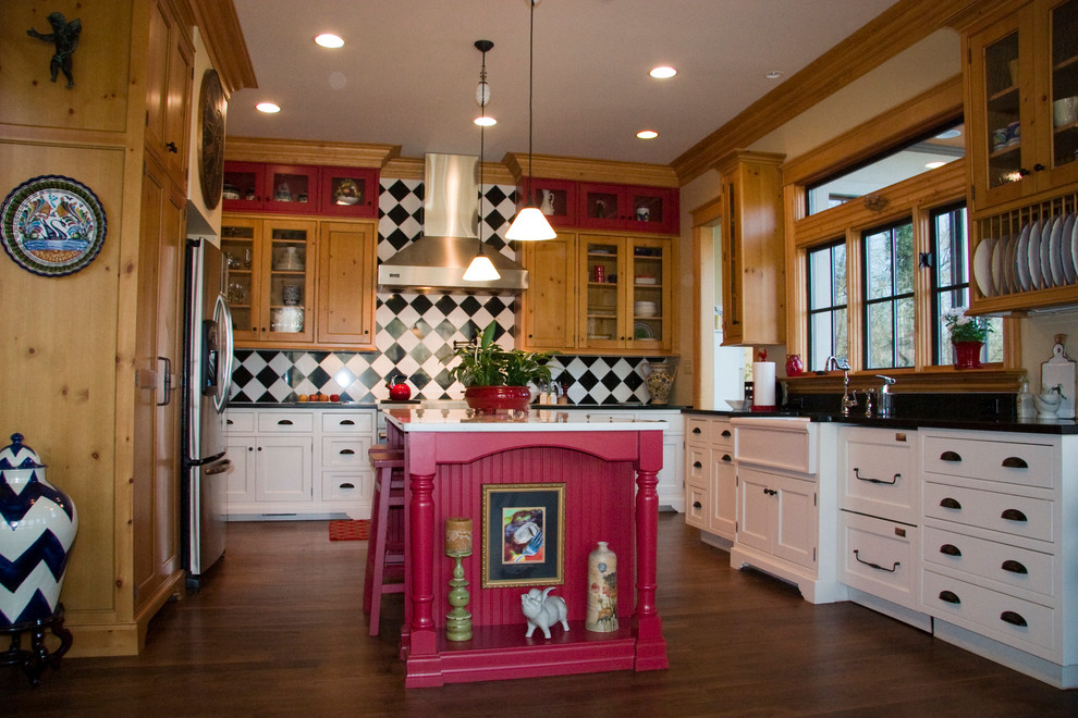 Eat-in kitchen - farmhouse u-shaped medium tone wood floor eat-in kitchen idea in Charlotte with a farmhouse sink, glass-front cabinets, light wood cabinets and an island