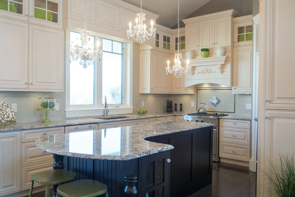 Example of a classic kitchen design in Other with white cabinets